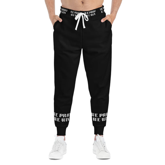 Inspirational "WE PRAY WE WIN" Athletic Black Joggers with White Text/Logo by Novelty Wonders